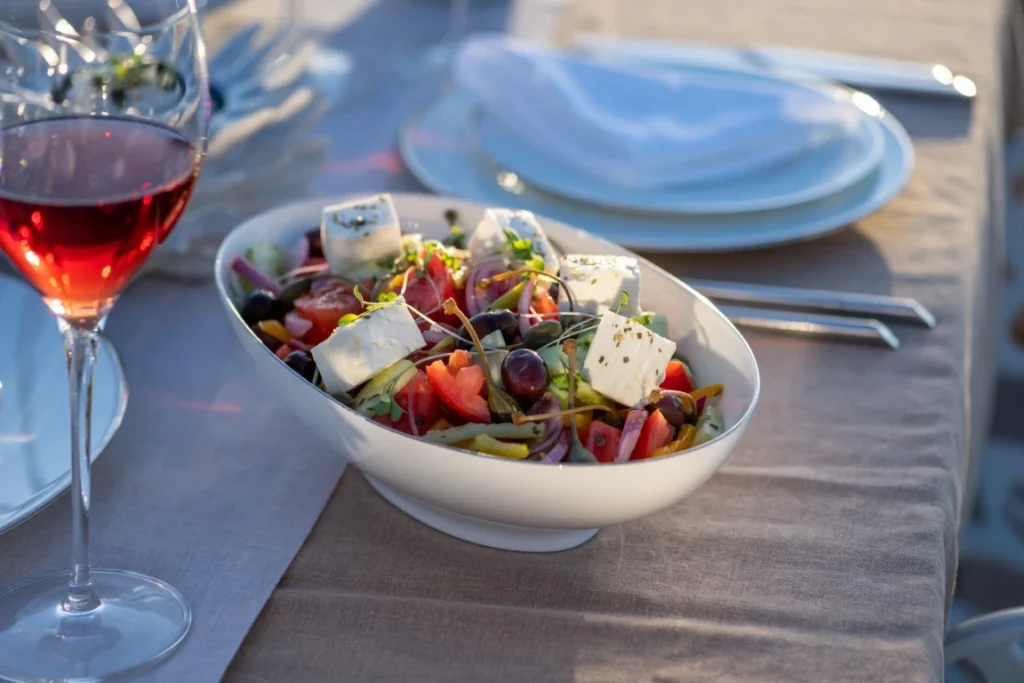 Greek salad with fresh vegetables feta cheese kalamata olives healthy food (Medium)