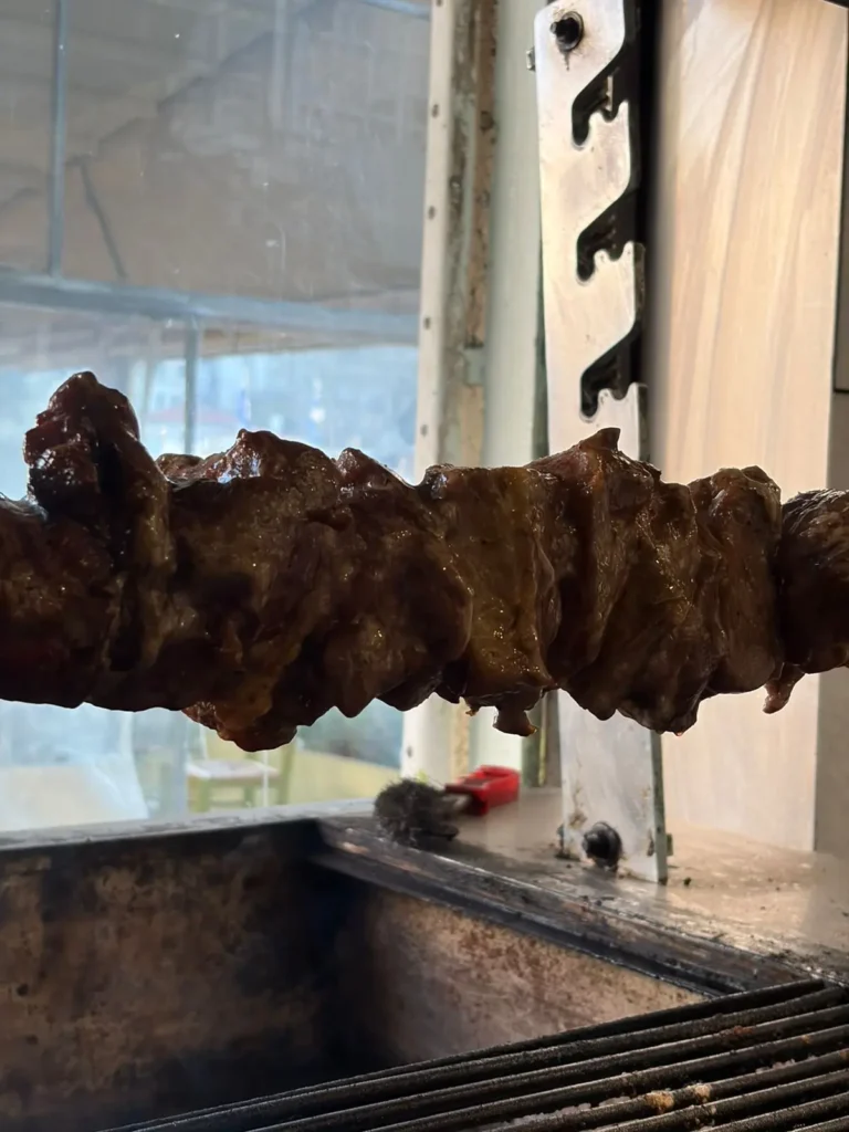 Ladokola kontosouvli on charcoal grill in old port skiathos